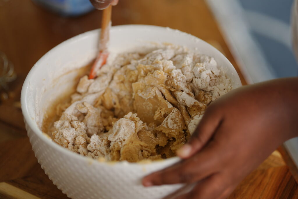Bowl of flour, baking soda, cornstarch, and cinnamon ready to be combined with wet ingredients