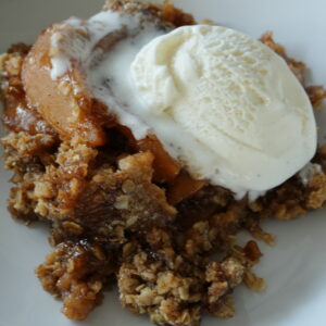 Slow Cooker Apple Crisp in white bowl