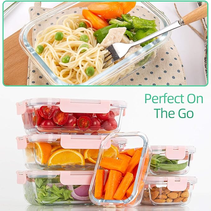 Stacked glass meal prep containers filled with fresh fruits, vegetables, and pasta, showcasing airtight pink lids for on-the-go food storage.