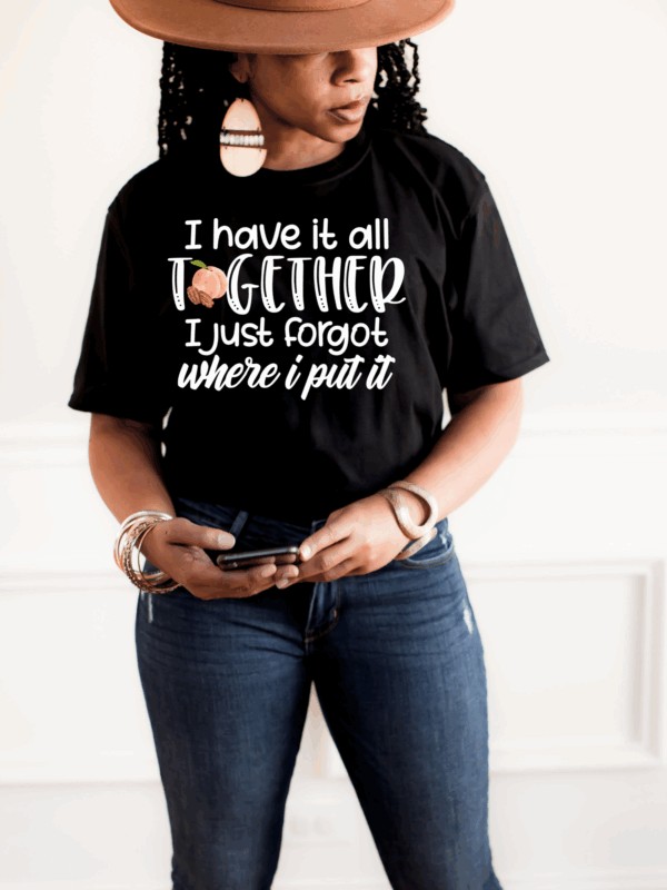 Funny graphic tee for moms in black with playful peach detail.
